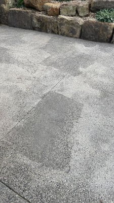 Bad sealer application on an exposed aggregate driveway