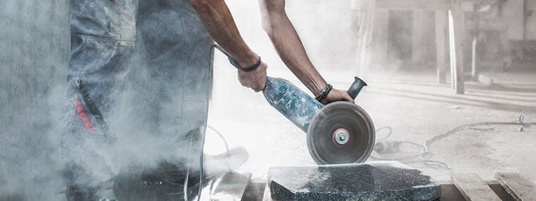 using a dry cutting wheel on stone producing very dusty conditions